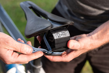 Enveloppe d'outils pour sangles de fixation